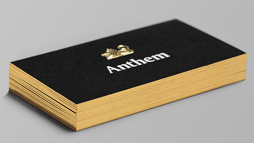 distinctive-gold-foil-embossed-logo-on-a-black-business-card-01